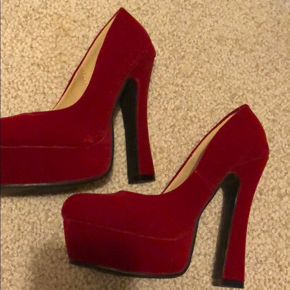 Red platform heels.